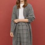 Shiny cardigan with gray side pockets